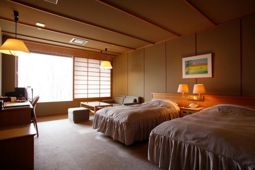 Shikotsuko Daiichi Hotel Suizantei Титосе Номер фото